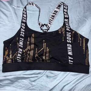 Her Universe Black and Gold Circuit Sports Bra